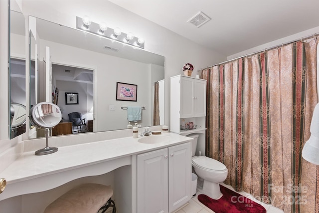 12350 Swan Wings Pl, Huntersville, NC 28078 - full bathroom with toilet, vanity, and tile patterned floors