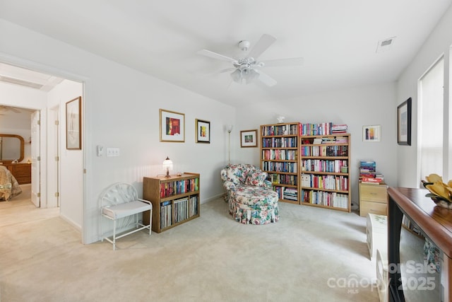 12350 Swan Wings Pl, Huntersville, NC 28078 - living area featuring carpet flooring, ceiling fan, and baseboards