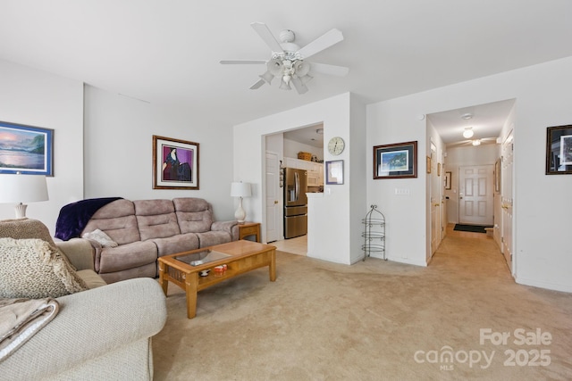 12350 Swan Wings Pl, Huntersville, NC 28078 - living room featuring light colored carpet, ceiling fan, and baseboards