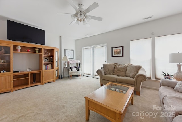 12350 Swan Wings Pl, Huntersville, NC 28078 - living area with light carpet and a ceiling fan