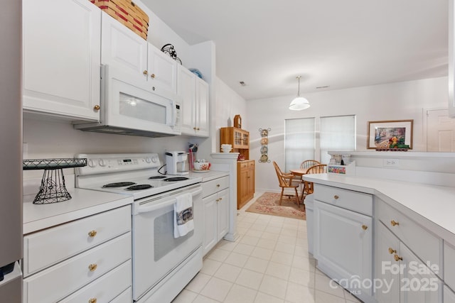 12350 Swan Wings Pl, Huntersville, NC 28078 - kitchen featuring white appliances, light countertops, white cabinets, and light tile patterned floors