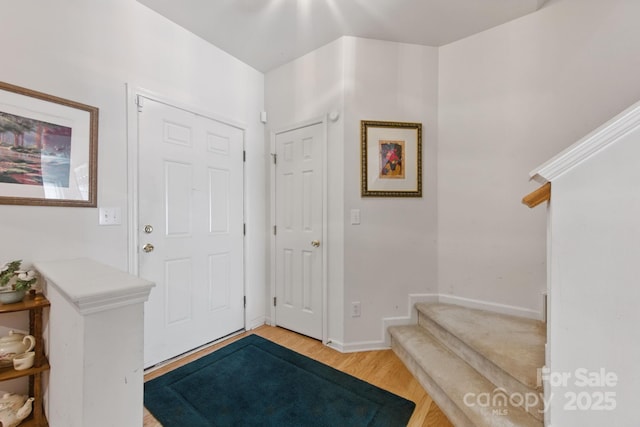 12350 Swan Wings Pl, Huntersville, NC 28078 - entrance foyer featuring light wood finished floors and baseboards