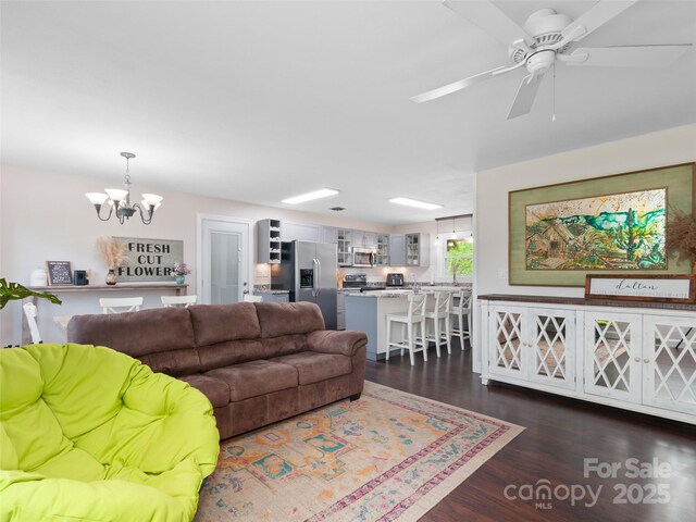 391 Ellen Ave, Canton, NC 28716 - living room featuring a chandelier, dark wood-style floors, and a ceiling fan