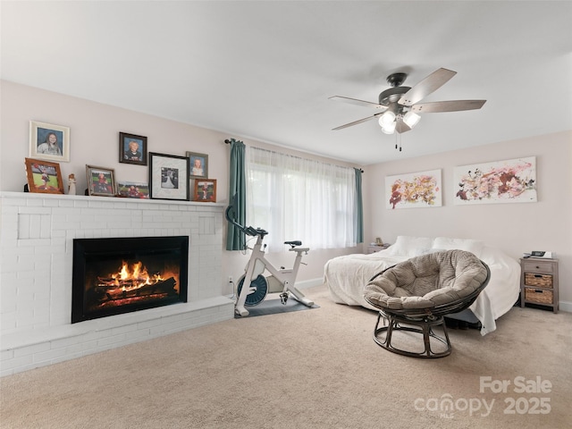 391 Ellen Ave, Canton, NC 28716 - bedroom with carpet, a brick fireplace, ceiling fan, and baseboards