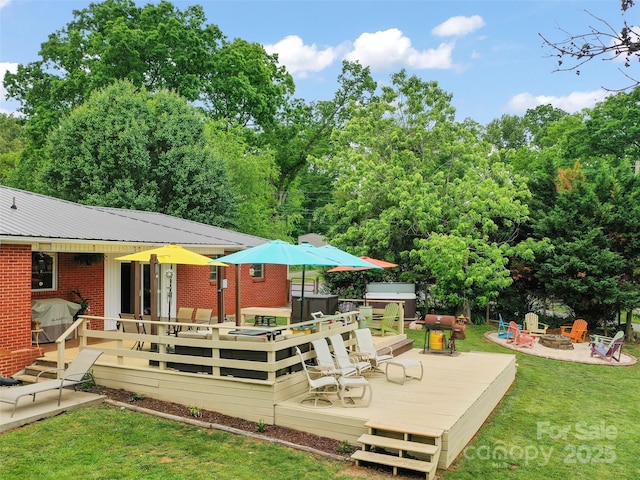 391 Ellen Ave, Canton, NC 28716 - wooden terrace featuring an outdoor fire pit, a hot tub, a yard, and a grill
