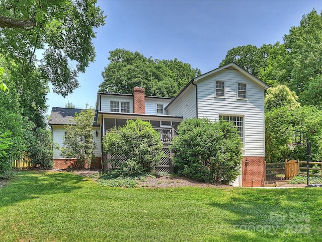 2919 Wickersham Rd, Charlotte, NC 28211 - rear view of house featuring a sunroom and a chimney