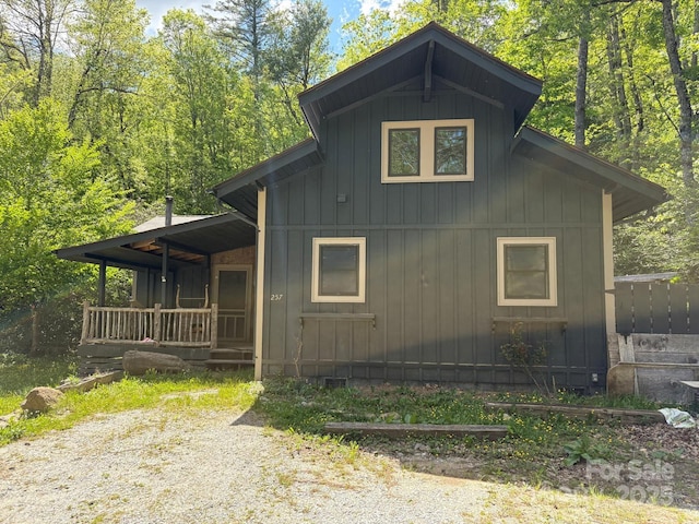 257 River Rd Unit 88, Newland, NC 28657 - view of front of house featuring a porch and board and batten siding