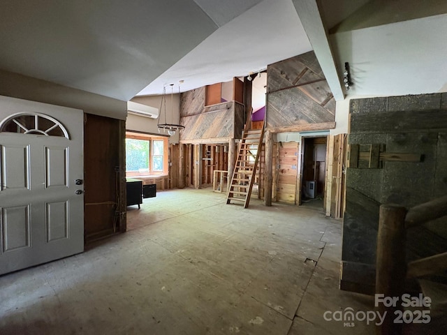 257 River Rd Unit 88, Newland, NC 28657 - miscellaneous room featuring high vaulted ceiling, stairway, and wood walls