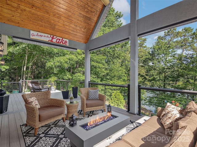 92 Island View Ct, Mill Spring, NC 28756 - wooden terrace featuring view of scattered trees and an outdoor living space with a fire pit