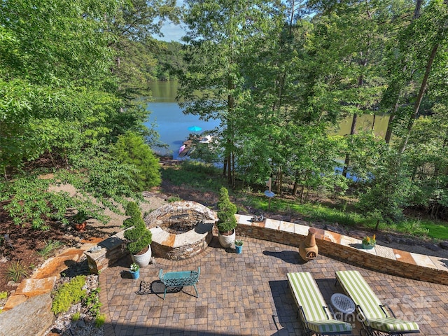 92 Island View Ct, Mill Spring, NC 28756 - view of patio with a fire pit and a water view