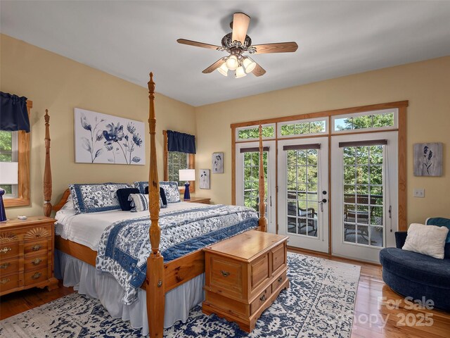 92 Island View Ct, Mill Spring, NC 28756 - bedroom featuring access to outside, wood finished floors, and a ceiling fan