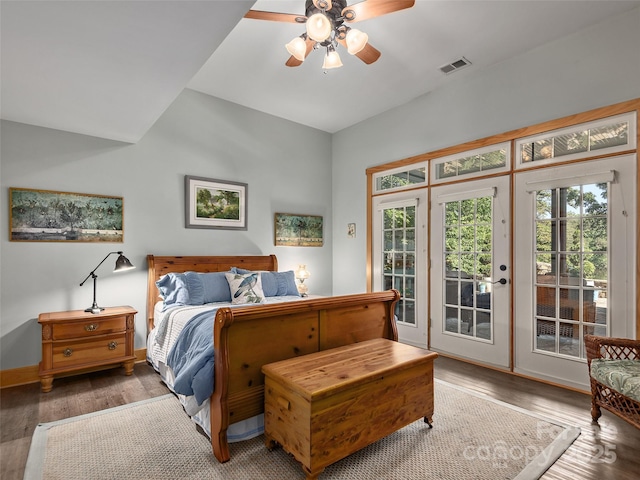 92 Island View Ct, Mill Spring, NC 28756 - bedroom with access to exterior, wood finished floors, lofted ceiling, a ceiling fan, and baseboards