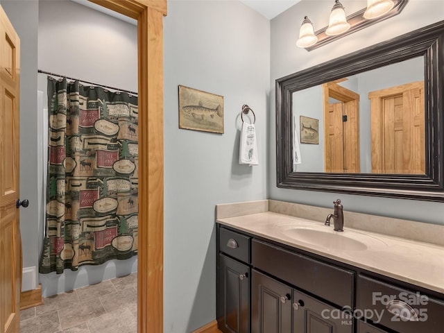 92 Island View Ct, Mill Spring, NC 28756 - full bathroom featuring vanity, a shower with shower curtain, and stone finish flooring