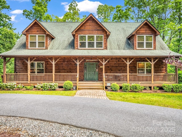 287 Matho Trce, Lake Lure, NC 28746 - log cabin featuring a porch, log exterior, and a shingled roof