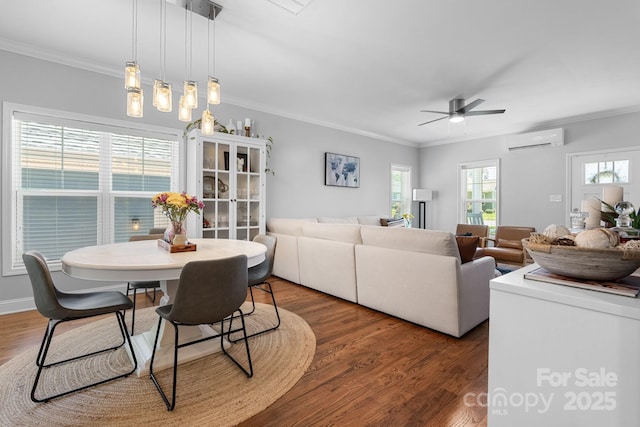 1067 33rd Avenue Loop NE, Hickory, NC 28601 - dining space with a wall mounted air conditioner, ceiling fan, wood finished floors, and ornamental molding