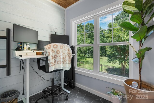 1067 33rd Avenue Loop NE, Hickory, NC 28601 - office with dark tile patterned flooring, baseboards, and wooden walls
