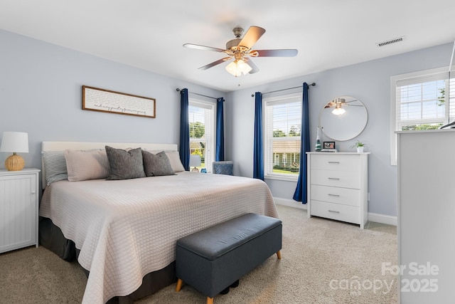 1067 33rd Avenue Loop NE, Hickory, NC 28601 - bedroom with light colored carpet, baseboards, and a ceiling fan