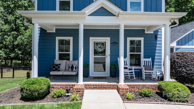1067 33rd Avenue Loop NE, Hickory, NC 28601 - property entrance featuring a porch and board and batten siding