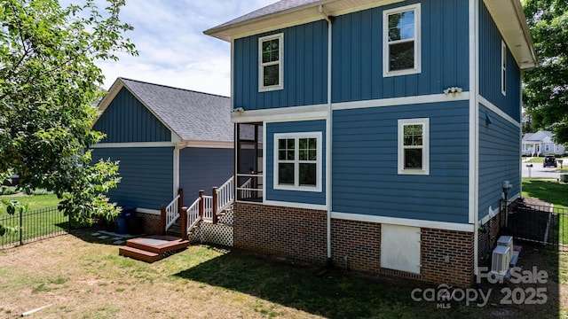1067 33rd Avenue Loop NE, Hickory, NC 28601 - rear view of house featuring board and batten siding