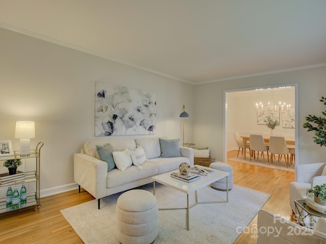 6116 Springhouse Ln, Charlotte, NC 28211 - living room with wood finished floors, ornamental molding, and a chandelier