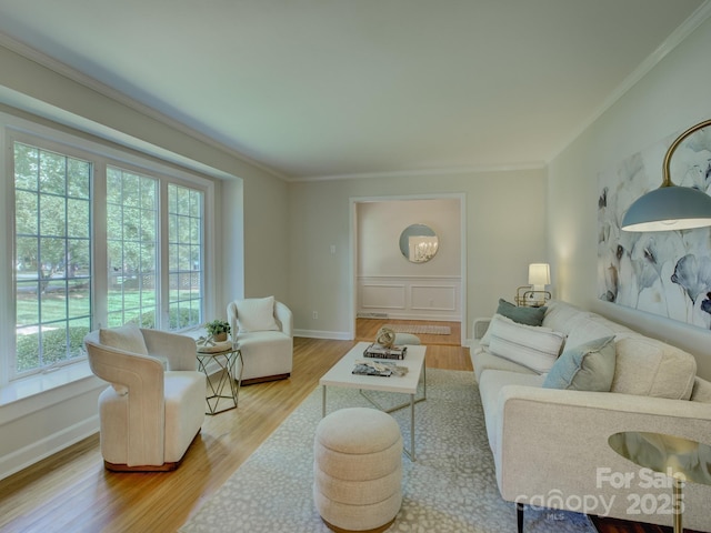 6116 Springhouse Ln, Charlotte, NC 28211 - living area featuring plenty of natural light, crown molding, and wood finished floors