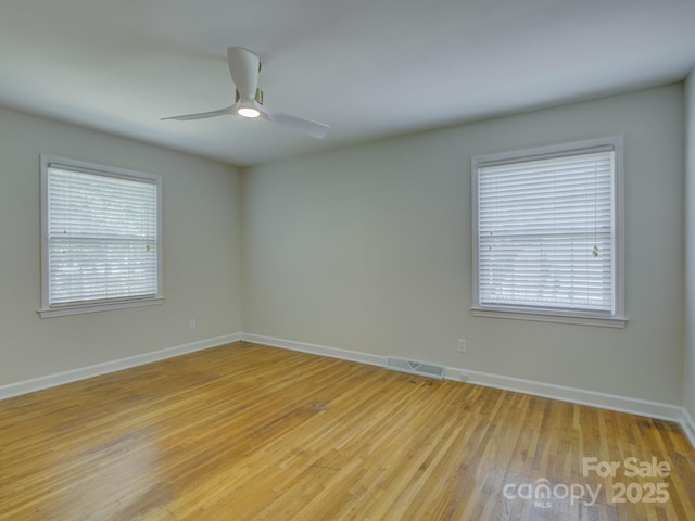6116 Springhouse Ln, Charlotte, NC 28211 - empty room featuring light wood-style flooring and ceiling fan