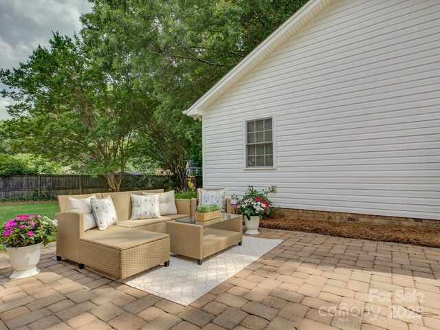 6116 Springhouse Ln, Charlotte, NC 28211 - fenced backyard with outdoor lounge area and a patio area