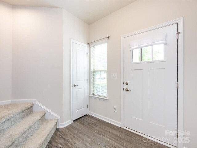 403 Park Meadows Dr, Matthews, NC 28104 - entryway featuring wood finished floors, baseboards, and stairway