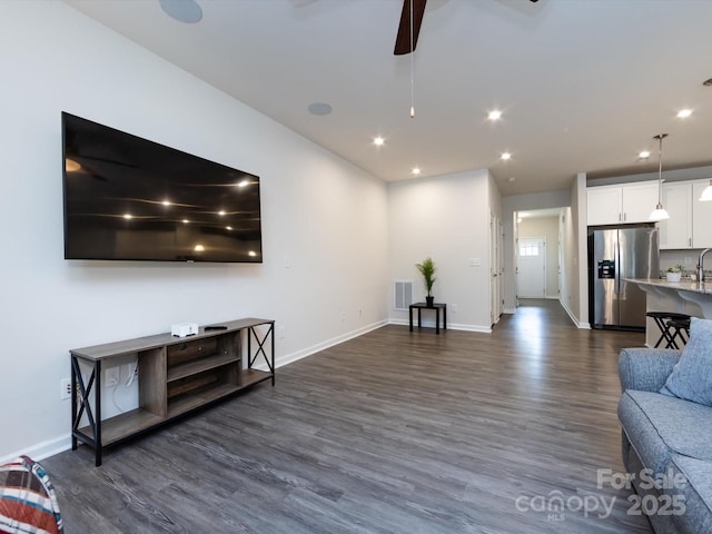403 Park Meadows Dr, Matthews, NC 28104 - living area featuring dark wood-type flooring, ceiling fan, baseboards, and recessed lighting