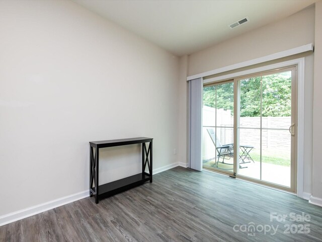 403 Park Meadows Dr, Matthews, NC 28104 - empty room with dark wood-style floors and baseboards