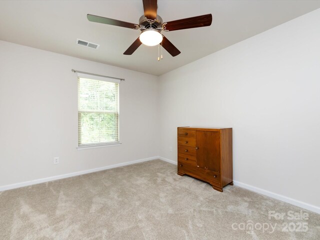 403 Park Meadows Dr, Matthews, NC 28104 - carpeted spare room with baseboards and ceiling fan
