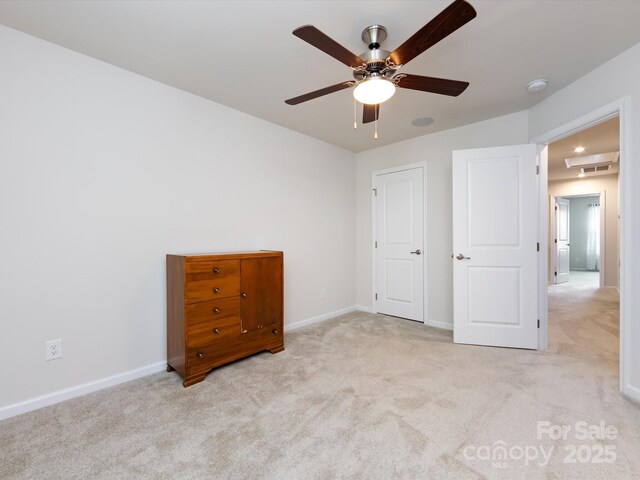 403 Park Meadows Dr, Matthews, NC 28104 - unfurnished bedroom featuring carpet flooring, baseboards, a ceiling fan, and attic access