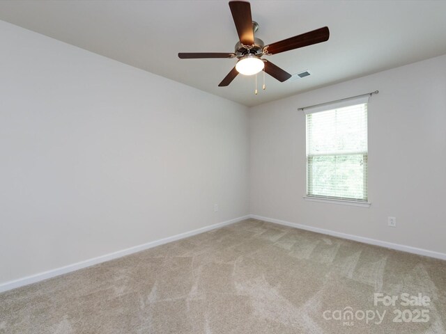 403 Park Meadows Dr, Matthews, NC 28104 - unfurnished room featuring light colored carpet, baseboards, and a ceiling fan