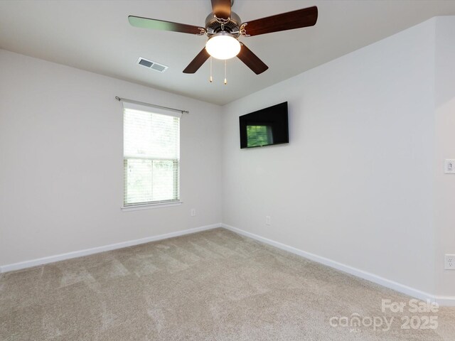 403 Park Meadows Dr, Matthews, NC 28104 - spare room with light colored carpet, baseboards, and a ceiling fan