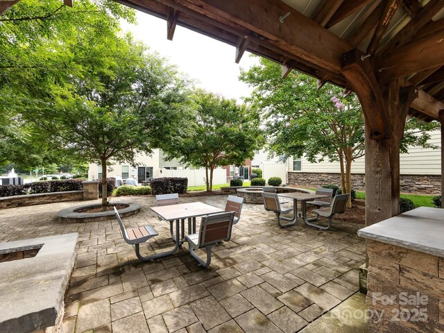 403 Park Meadows Dr, Matthews, NC 28104 - view of patio / terrace featuring an outdoor fire pit and outdoor dining area