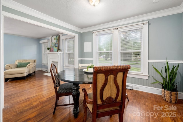 34 Admiral Ave SW, Concord, NC 28027 - dining space with wood finished floors, ornamental molding, and baseboards