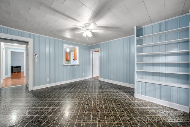 34 Admiral Ave SW, Concord, NC 28027 - unfurnished room with crown molding, a ceiling fan, and baseboards
