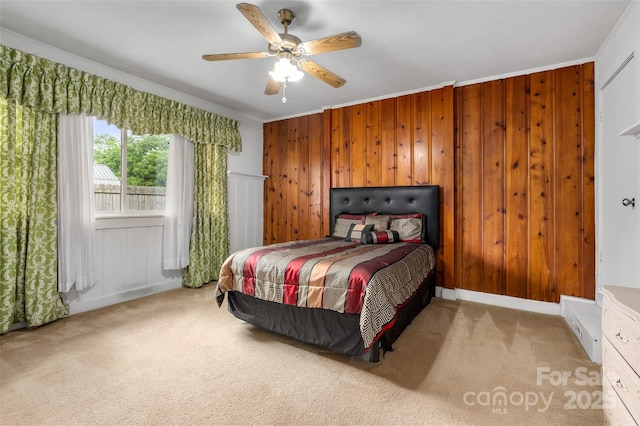 34 Admiral Ave SW, Concord, NC 28027 - bedroom with carpet, baseboards, a ceiling fan, and wooden walls