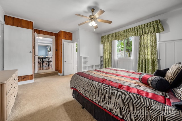34 Admiral Ave SW, Concord, NC 28027 - bedroom with light carpet, wooden walls, and ceiling fan