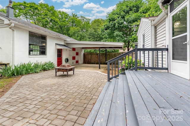 34 Admiral Ave SW, Concord, NC 28027 - view of patio with a wooden deck and a fire pit