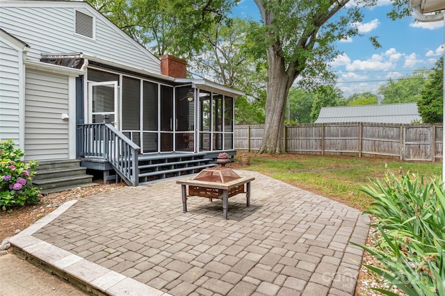 34 Admiral Ave SW, Concord, NC 28027 - fenced backyard with a sunroom and a patio