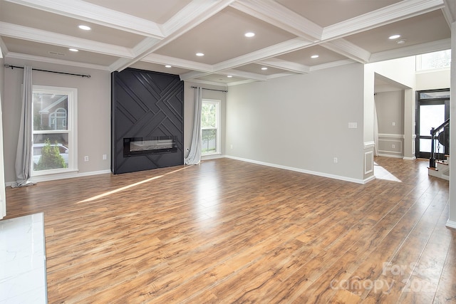 6400 Morningsong Ln, Charlotte, NC 28269 - unfurnished living room with ornamental molding, coffered ceiling, a fireplace, wood finished floors, and beamed ceiling