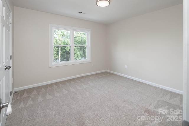 6400 Morningsong Ln, Charlotte, NC 28269 - carpeted empty room featuring baseboards