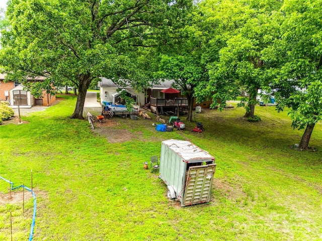 504 Amon Ln, Pineville, NC 28134 - view of grassy yard featuring a wooden deck