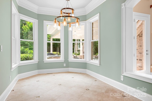 3204 Mcpherson St, Waxhaw, NC 28173 - unfurnished dining area featuring a chandelier, ornamental molding, tile patterned floors, and baseboards