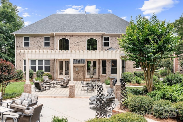 3204 Mcpherson St, Waxhaw, NC 28173 - rear view of property with an outdoor hangout area, french doors, brick siding, and a patio area