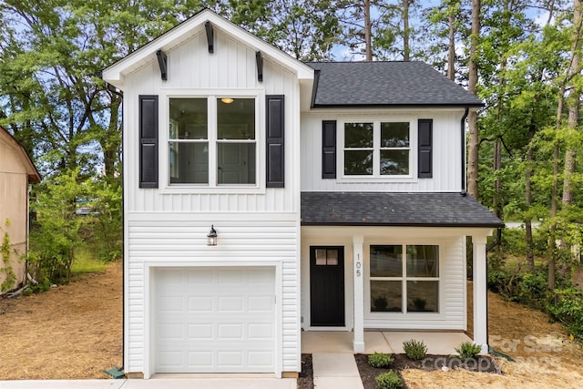 105 Spring Garden Dr, Gastonia, NC 28052 - view of front of house featuring a shingled roof, an attached garage, board and batten siding, covered porch, and driveway