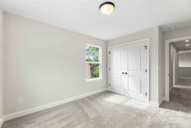 105 Spring Garden Dr, Gastonia, NC 28052 - unfurnished bedroom featuring carpet, baseboards, and a closet