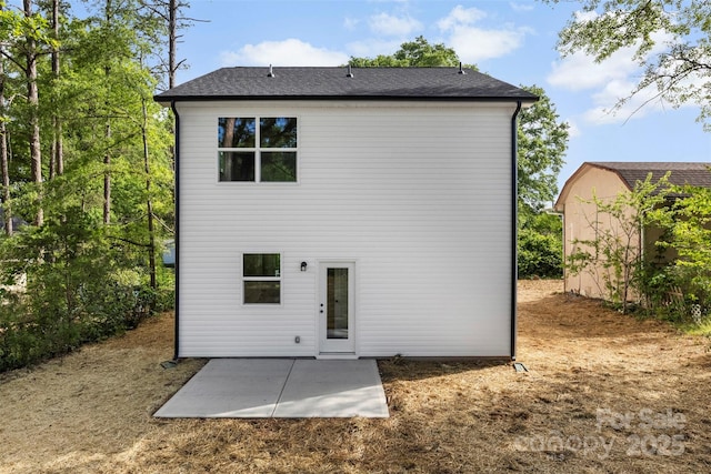 105 Spring Garden Dr, Gastonia, NC 28052 - rear view of property with a patio area and roof with shingles