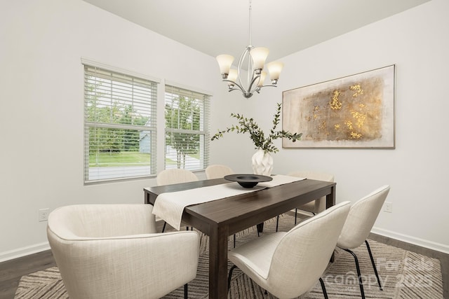 124 Canada Dr Unit 45, Statesville, NC 28166 - dining area featuring a chandelier, dark wood-style floors, and baseboards